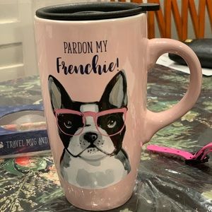 Ceramic travel mug with luggage tag